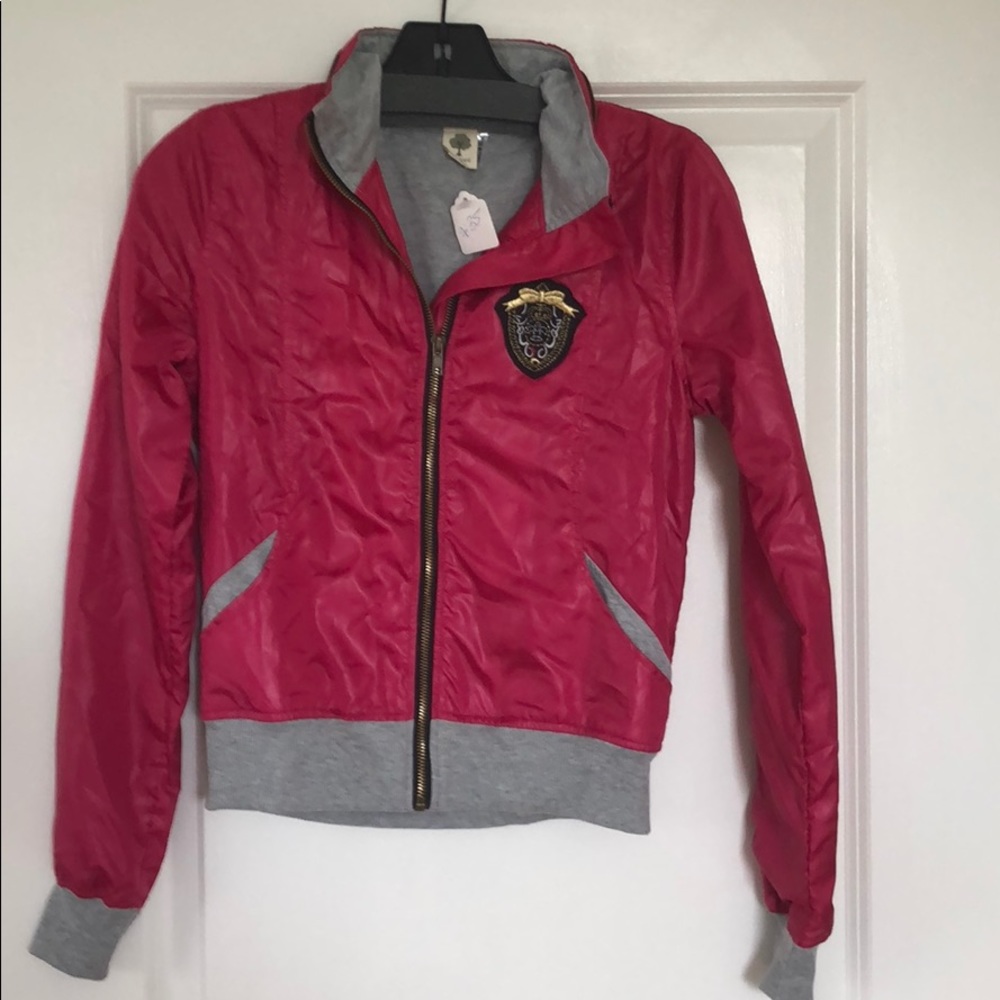 Brand new. Pink windbreaker